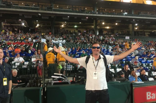 Nick Honachefsky at the Bassmaster Classic standing in front of the stands