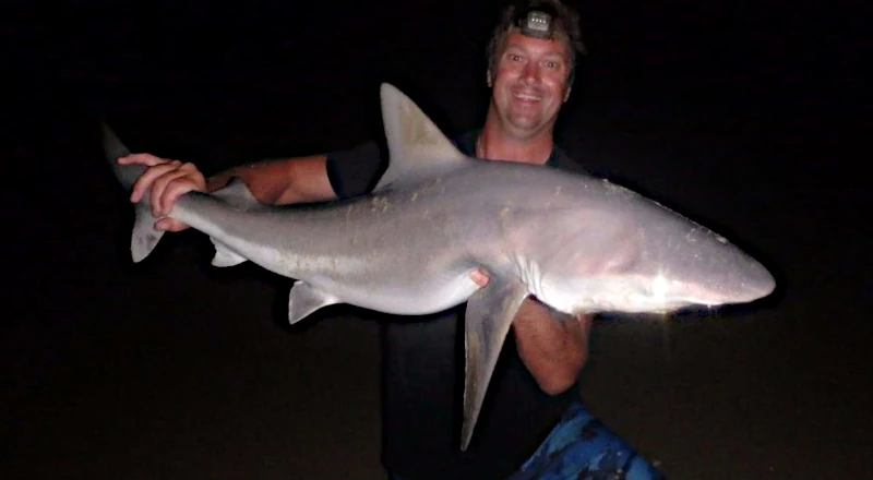 Nick Honachefsky holding a shark