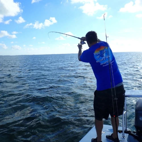 Nick Honachefsky casting from a boat