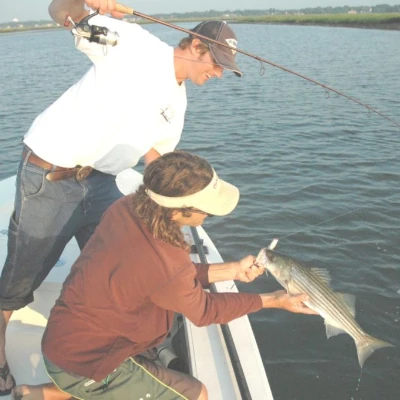 Two anglers that just landed a striper