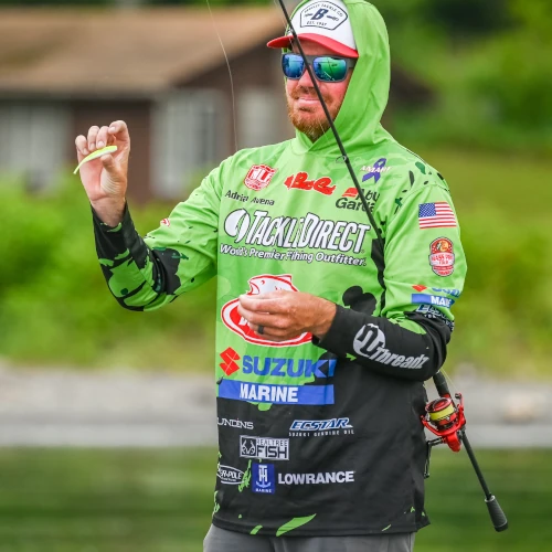 Adrian Avena holding the Berkley Gulp! Minnow in Chartreuse Shad that he used to win the tournament