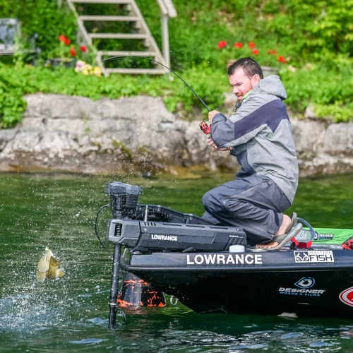 Adrian Avena in the middle of catching a bass