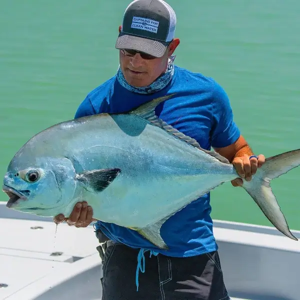 Tom Rowland holding a large fish